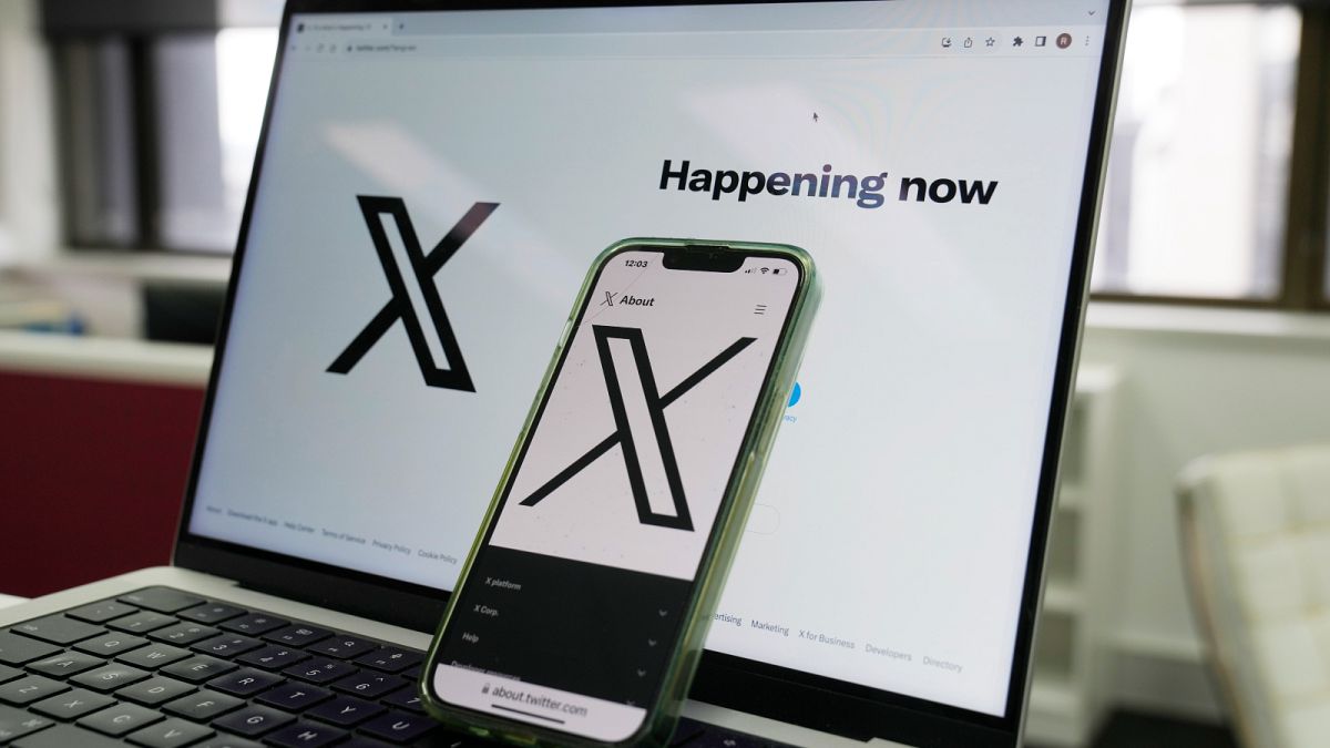The opening page of X displayed on a computer and a phone.
