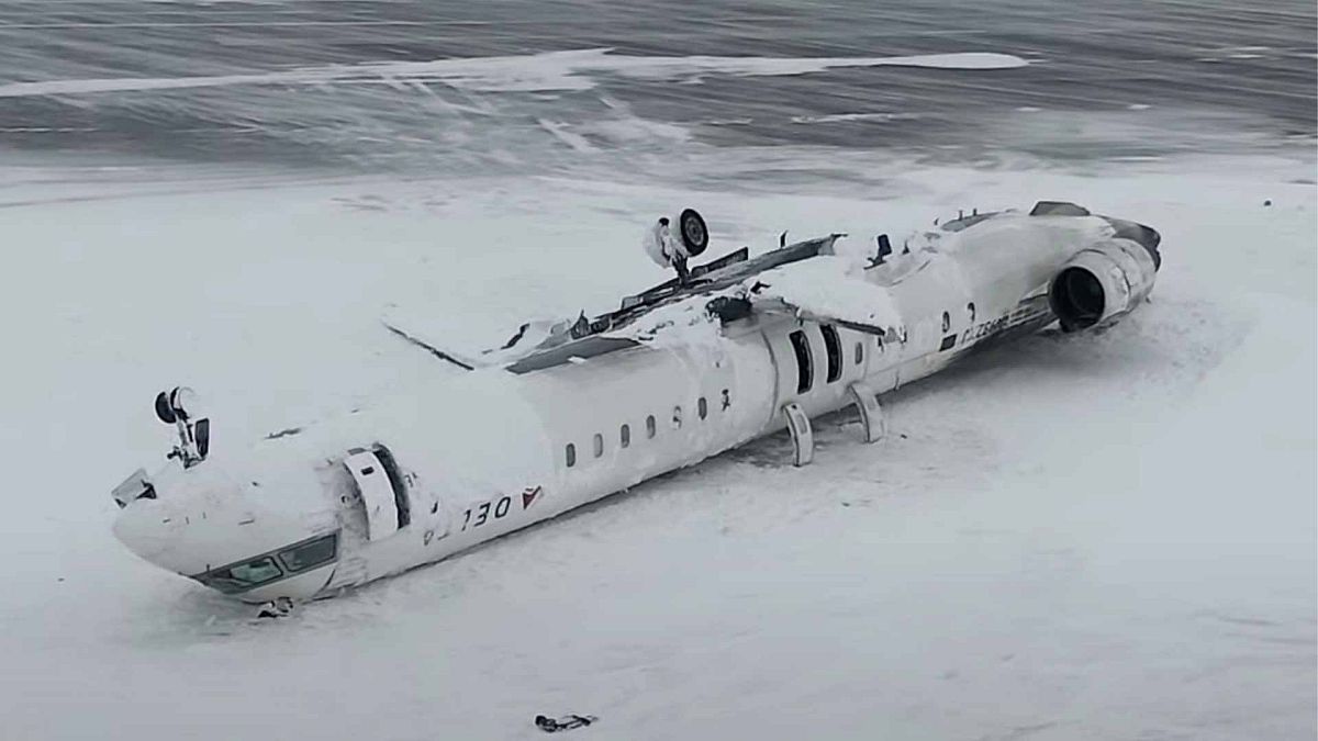 This image taken from video released by the Transportation Safety Board of Canada on Wednesday, Feb. 19, 2025, shows the crashed plane of Delta flight 4819 at Toronto airport