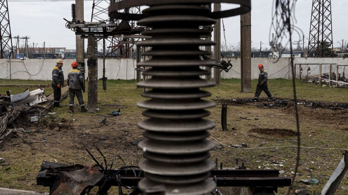 Workers of DTEK company work on a site of a substation destroyed by a Russian drone strike in undisclosed location, Ukraine, March 25, 2025