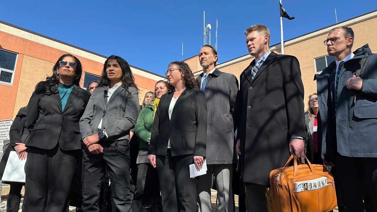 Greenpeace representatives talk with reporters outside the Morton County Courthouse in North Dakota, US.