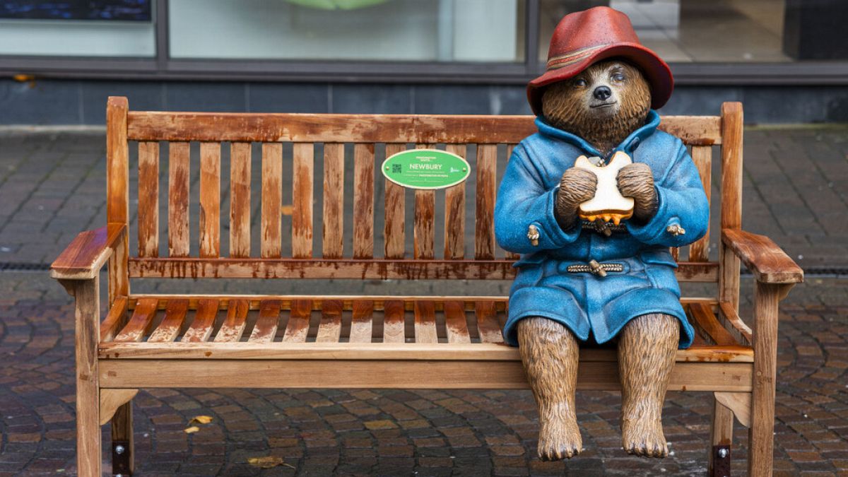 FILE: This photo made available by PinPep shows a statue of Paddington Bear in Newbury, England, during its unveiling on Oct. 8, 2024