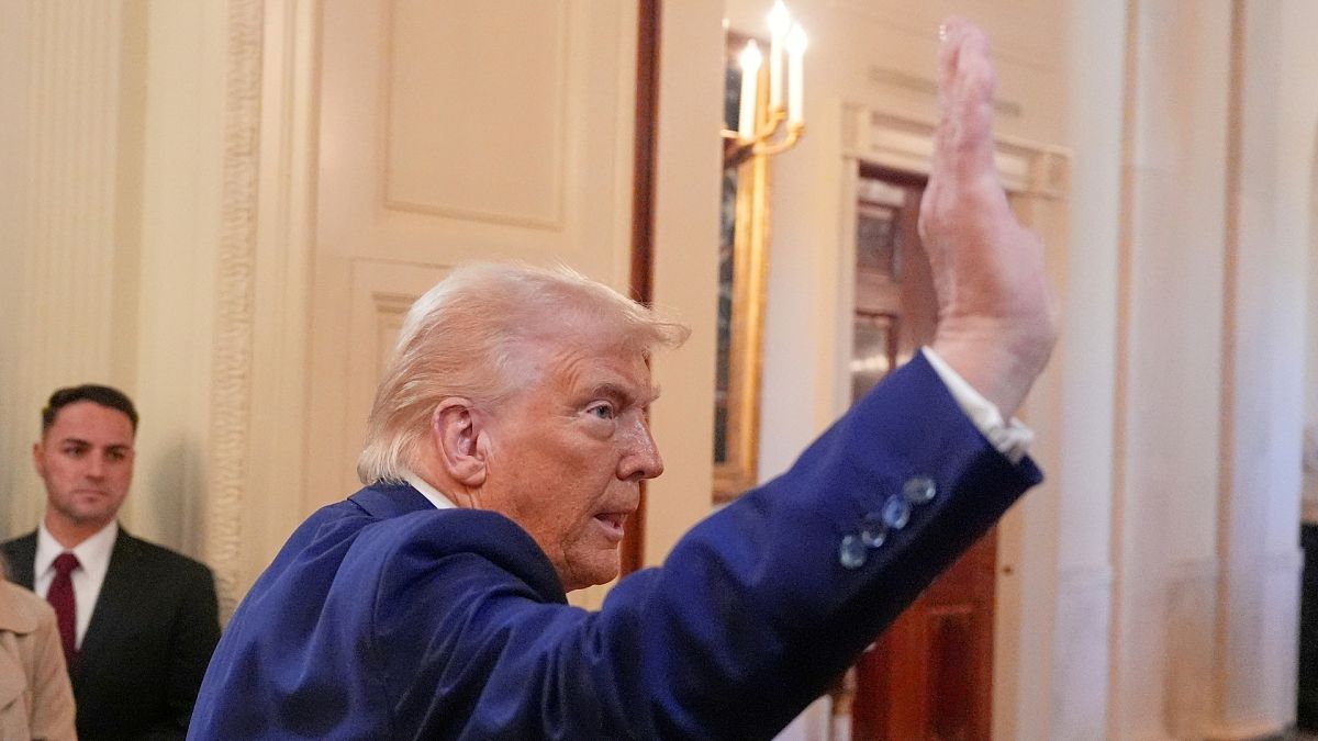 President Donald Trump departs after an event in the East Room of the White House.