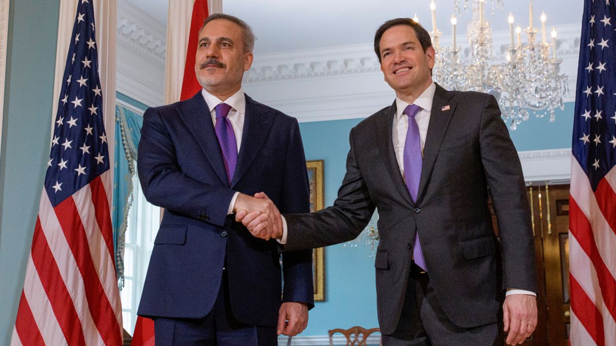 Secretary of State Marco Rubio, right, shakes the hand of Turkish Foreign Minister Hakan Fidan, left, at the State Department, 25 March 2025.